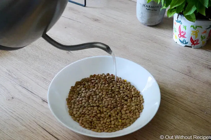 Pouring water into lentils