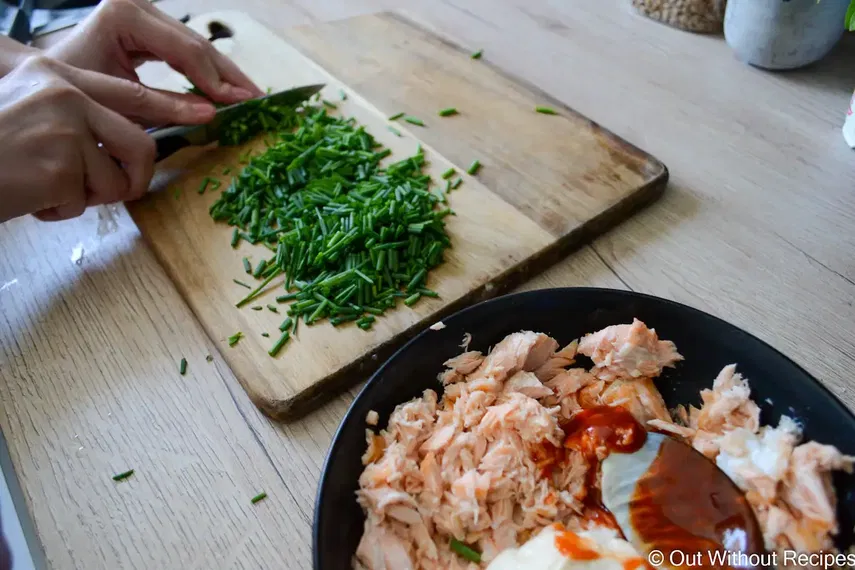 Cutting greens for salmon mayo mix