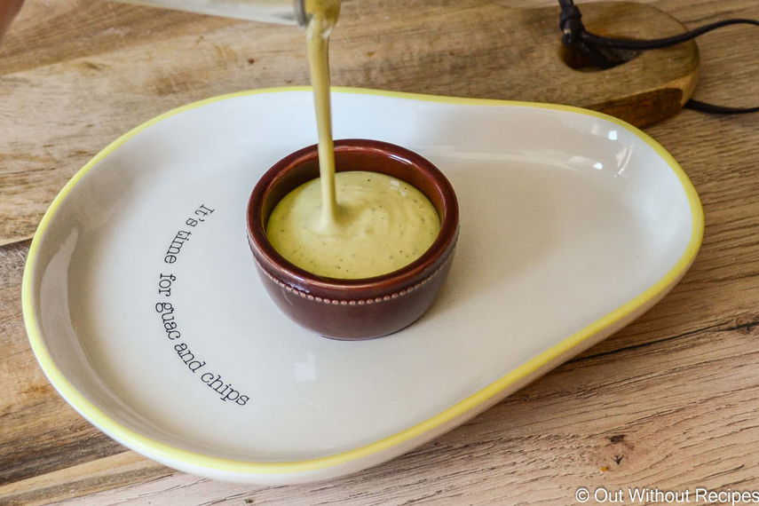 pouring mayo into a souce plate